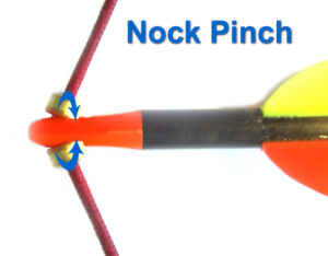 Nock pinch on arrow and bowstring
